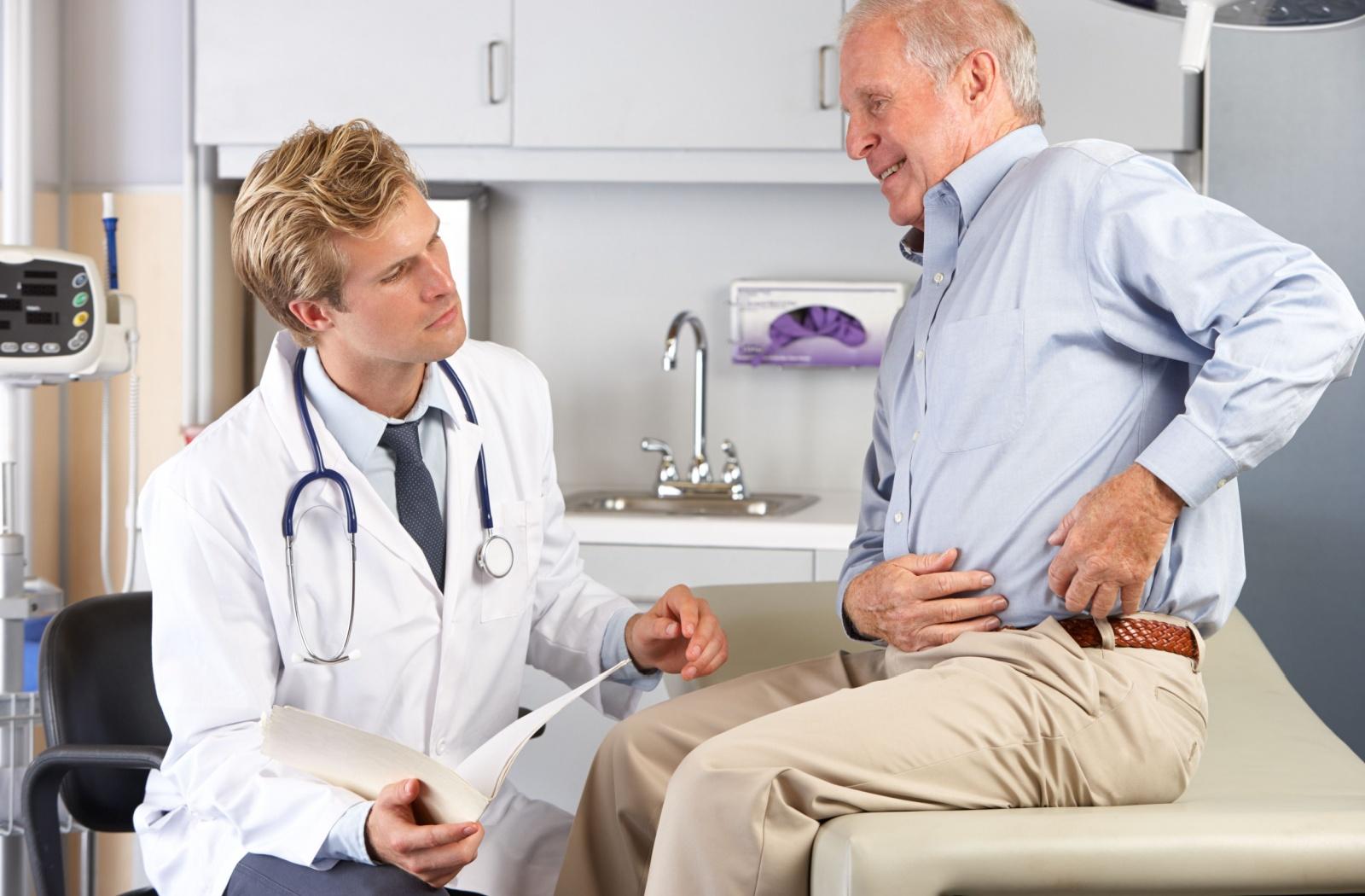 A senior visits the doctor after suffering an overuse injury in their hip after exercising too strenuously.